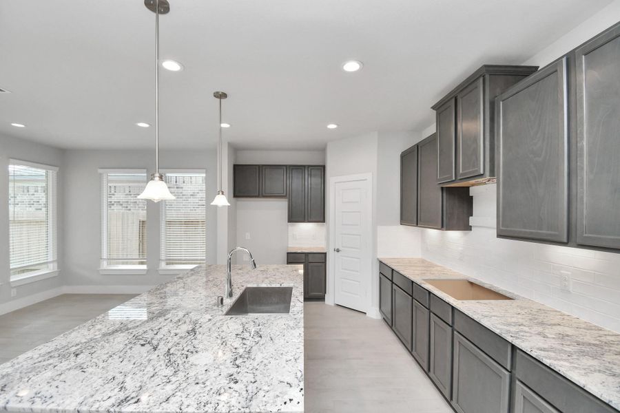 All of this overlooks your expansive family room, creating a perfect space for culinary delights and family gatherings. All of this overlooks your expansive family room, creating a perfect space for culinary delights and family gatherings.