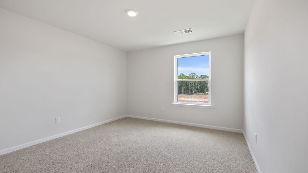 Spacious, unfurnished interior of a new home in Durbin Meadows Traditions, Fountain Inn (Image 21).