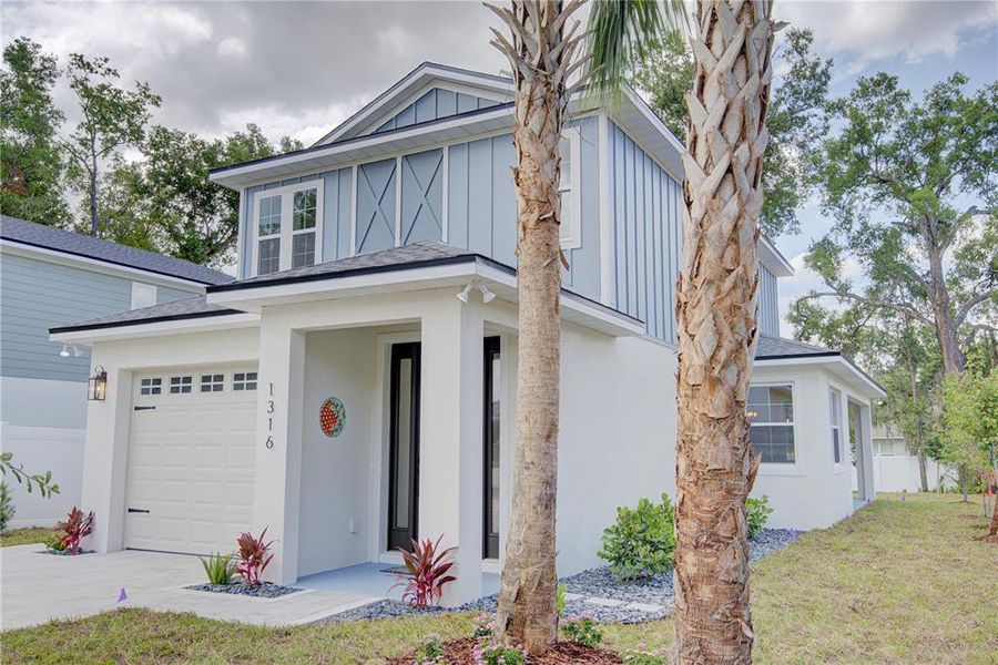 Front exterior of a new home in , Mount Dora, FL, highlighting curb appeal (Image 1). Front exterior of a new home in , Mount Dora, FL, highlighting curb appeal (Image 1).