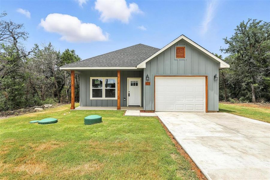 Front exterior of a new home in , Granbury, TX, highlighting curb appeal (Image 16). Front exterior of a new home in , Granbury, TX, highlighting curb appeal (Image 16).