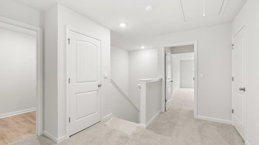 Spacious, unfurnished interior of a new home in Waypoint, Flowery Branch (Image 17).