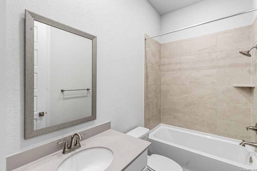 Furnished interior view inside a new home in Prominence, San Antonio (Image 27).