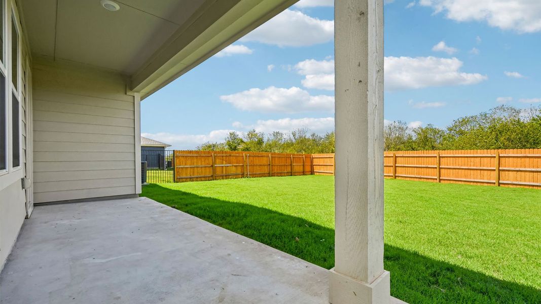 Exterior details and patio area of a home in Trails at Wildhorse, Austin (Image 25).