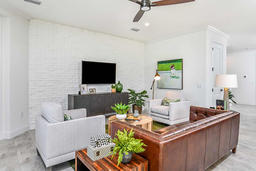 Representative furnished interior of a home built from the Triumph by Neal Communities in Grand Park, Sarasota (Image 7).