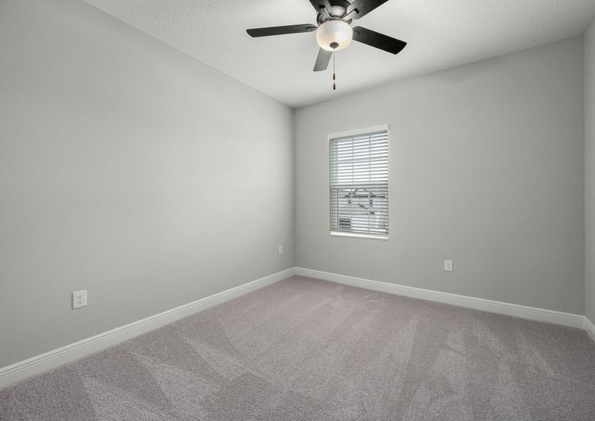 Each window also features faux wood blinds