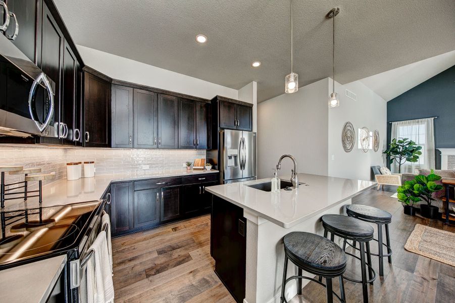 Representative furnished interior of a home built from the The Devon by Landmark Homes in The Lakes at Centerra, Loveland (Image 6). Representative furnished interior of a home built from the The Devon by Landmark Homes in The Lakes at Centerra, Loveland (Image 6).