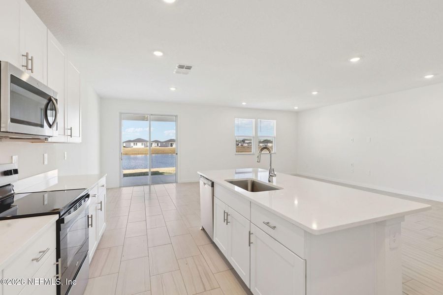 Furnished interior view inside a new home in Lakes at Bella Lago - Signature Series, Green Cove Springs (Image 12).