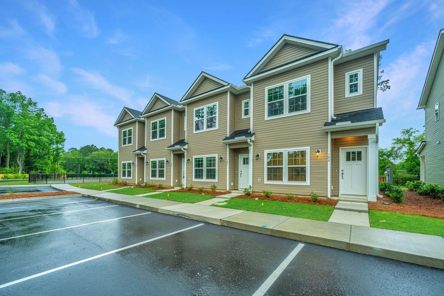 Front exterior of a new home in , Wando, SC, highlighting curb appeal (Image 28).