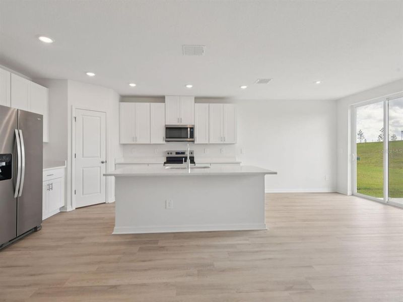 Furnished interior view inside a new home in Salt Meadows - Classic Series, Parrish (Image 8).