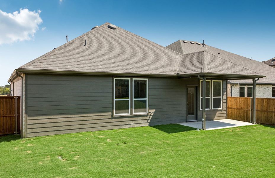 Exterior details and patio area of a home in Pinnacle at Legacy Hills, Celina (Image 2). Exterior details and patio area of a home in Pinnacle at Legacy Hills, Celina (Image 2).
