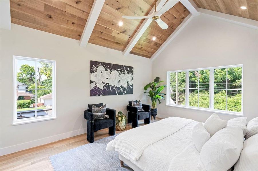 Bedroom featuring ceiling fan, beamed ceiling, high vaulted ceiling, and wooden ceiling