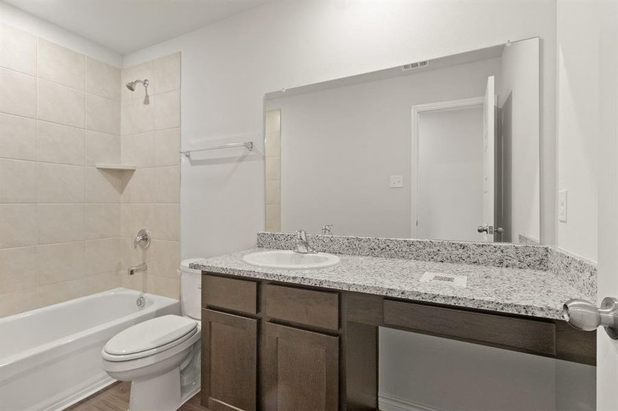 Furnished interior view inside a new home in Retreat at Fossil Creek, Fort Worth (Image 8). Furnished interior view inside a new home in Retreat at Fossil Creek, Fort Worth (Image 8).