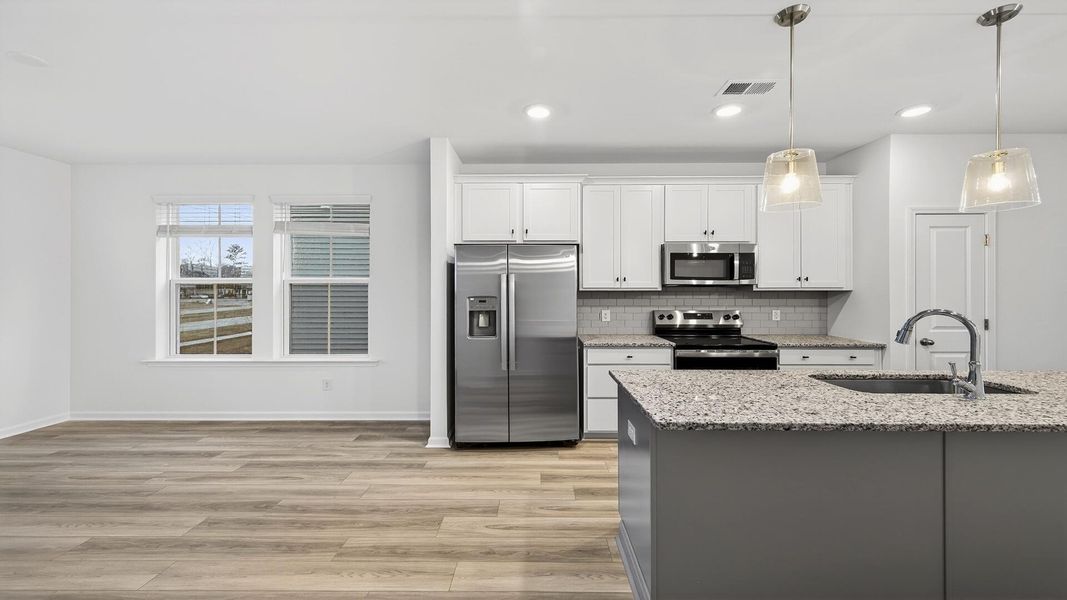 Furnished interior view inside a new home in Clear Springs Townhomes, North Charleston (Image 12).