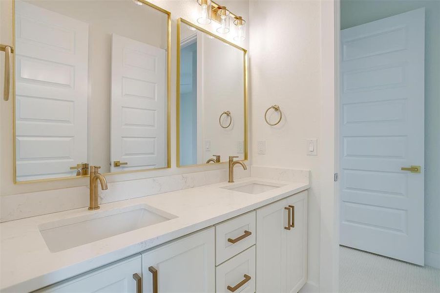 Bathroom featuring double sink vanity