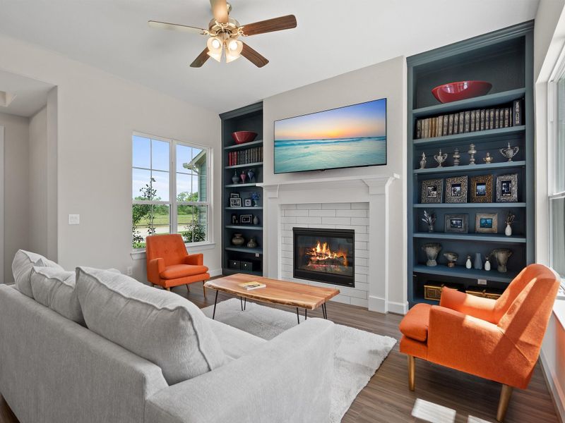 From the comfort of your living room, enjoy sweeping views of the surrounding neighborhood. This inviting space seamlessly blends style and scenery, offering a front-row seat to the beauty just beyond your doorstep. Image depicts home as-is with some virtual staging. From the comfort of your living room, enjoy sweeping views of the surrounding neighborhood. This inviting space seamlessly blends style and scenery, offering a front-row seat to the beauty just beyond your doorstep. Image depicts home as-is with some virtual staging.