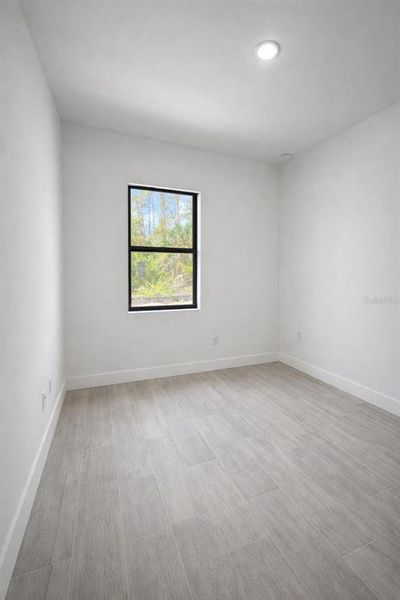 Spacious, unfurnished interior of a new home in , Port Charlotte (Image 16).