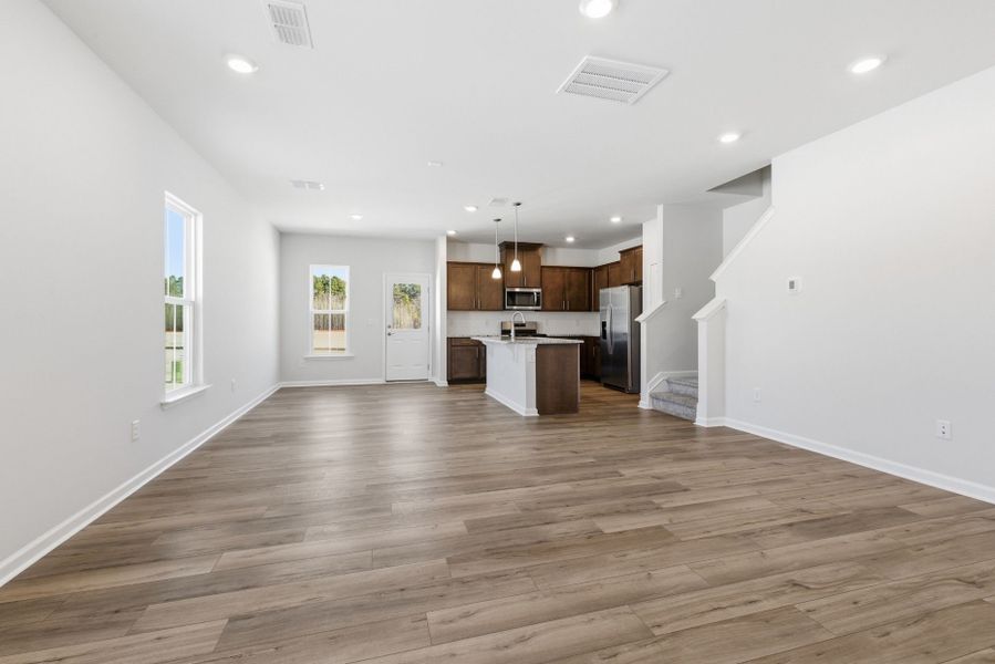 Spacious, unfurnished interior of a new home in Poets Walk, Whitsett (Image 43).
