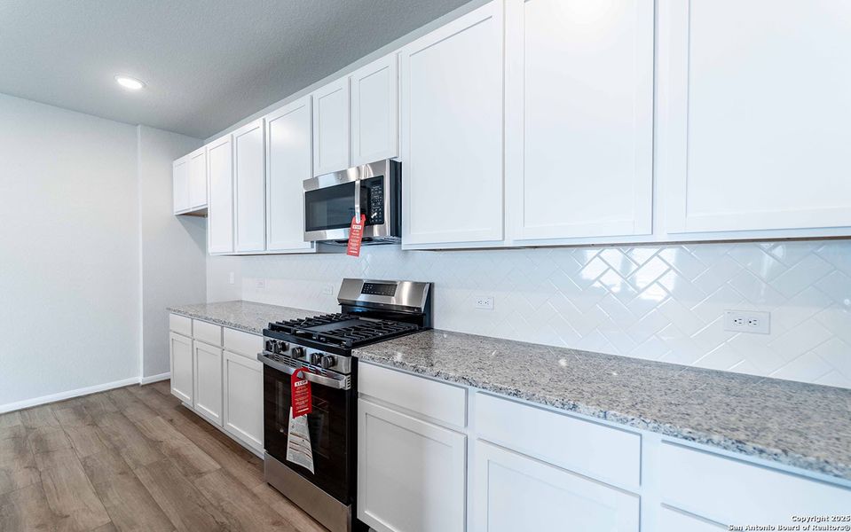 Furnished interior view inside a new home in Hennersby Hollow, San Antonio (Image 3). Furnished interior view inside a new home in Hennersby Hollow, San Antonio (Image 3).