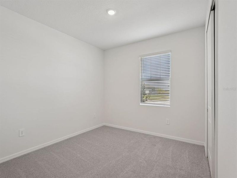 Spacious, unfurnished interior of a new home in Coasterra - Reserve Series, Palmetto (Image 20).