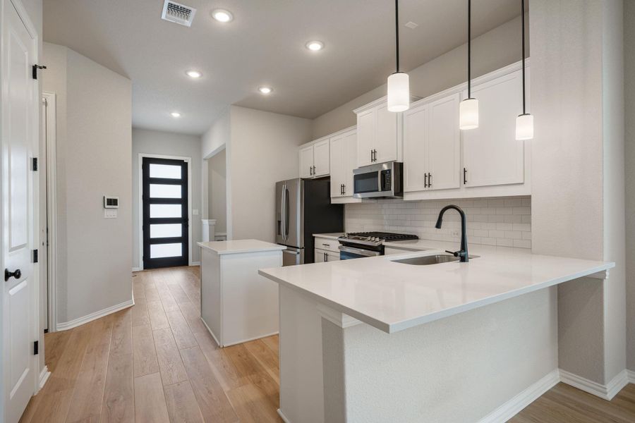 Furnished interior view inside a new home in Heritage, Dripping Springs (Image 9).