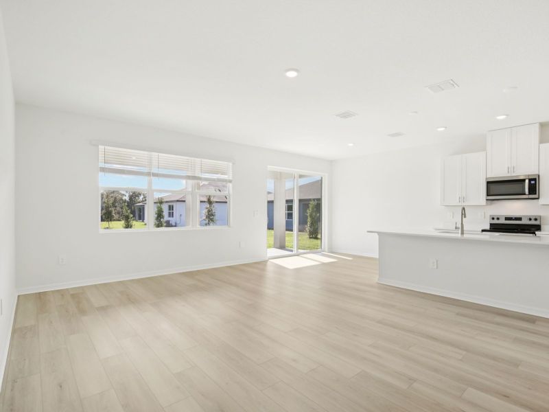 Spacious, unfurnished interior of a new home in Coasterra - Reserve Series, Palmetto (Image 11).