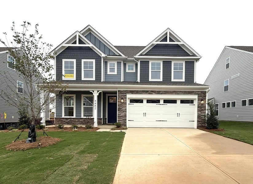 Front exterior of a new home in Carrington, Stanley, NC, highlighting curb appeal (Image 1). Front exterior of a new home in Carrington, Stanley, NC, highlighting curb appeal (Image 1).