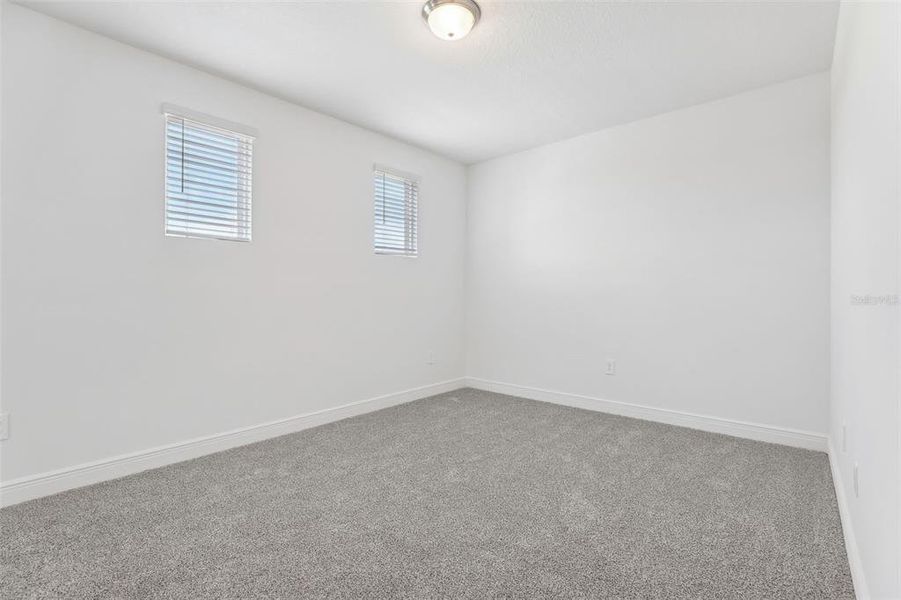 Spacious, unfurnished interior of a new home in Cyrene at Minneola - Villas, Minneola (Image 28).