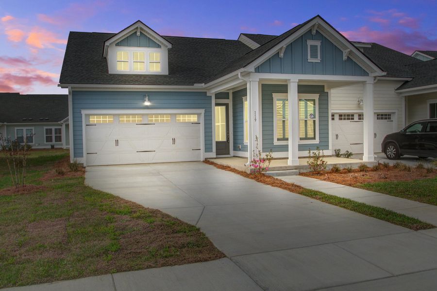 Front exterior of a new home in Carnes Crossroads, Summerville, SC, highlighting curb appeal (Image 2). Front exterior of a new home in Carnes Crossroads, Summerville, SC, highlighting curb appeal (Image 2).