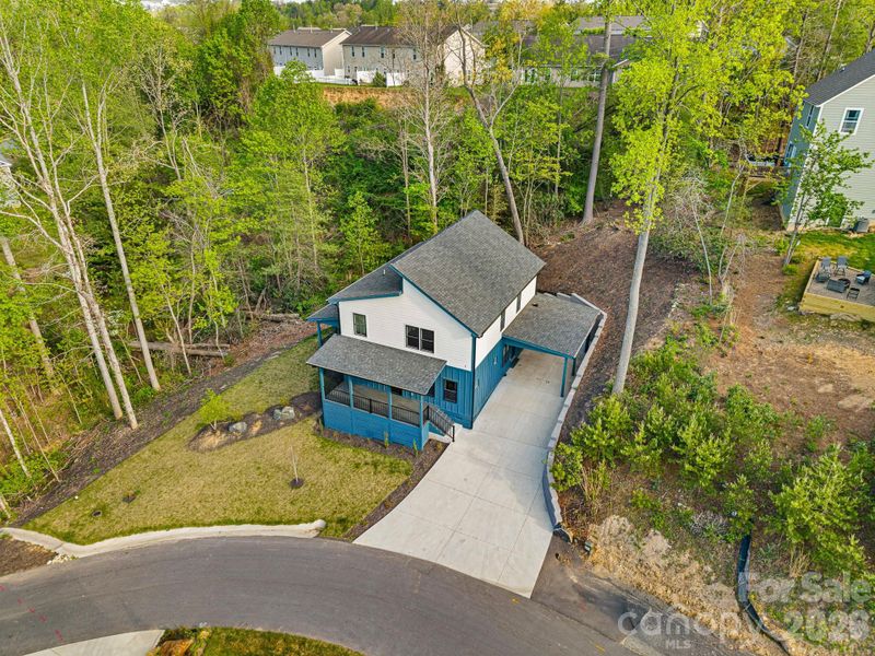 Front exterior of a new home in , Arden, NC, highlighting curb appeal (Image 26).