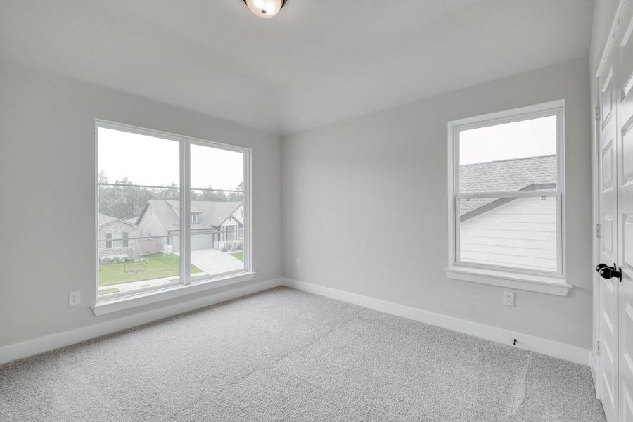 Spacious, unfurnished interior of a new home in The Colony, Bastrop (Image 21).