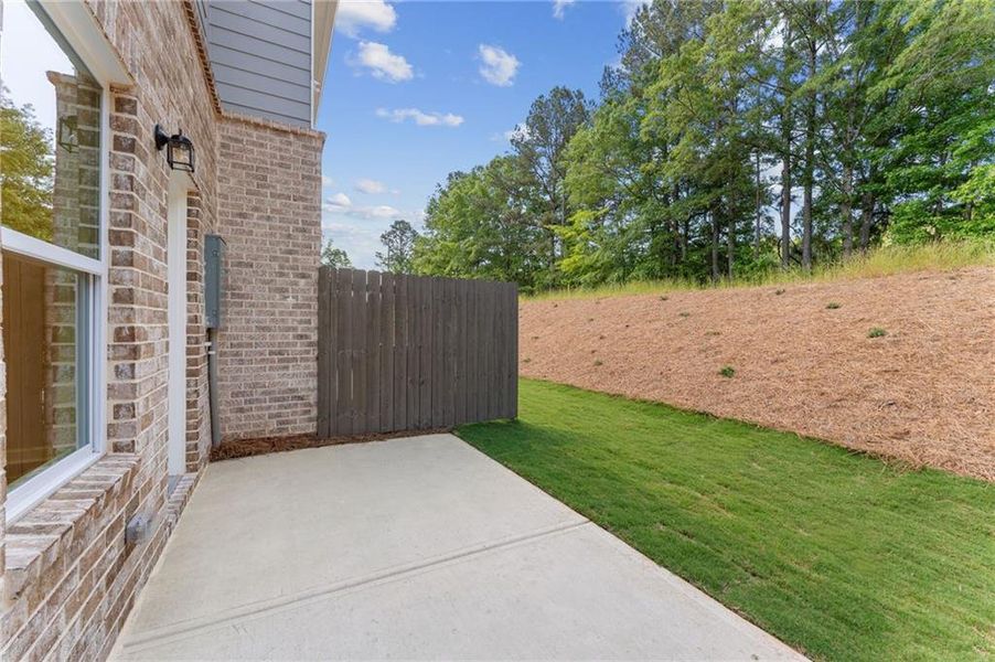 Exterior details and patio area of a home in Wildwood Place, Powder Springs (Image 23).
