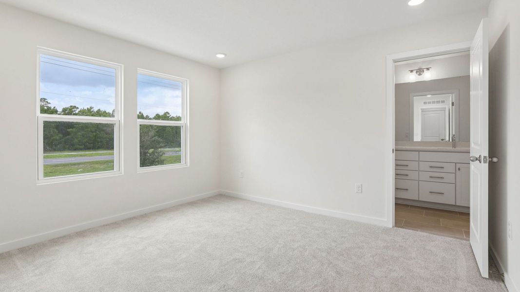 Furnished interior view inside a new home in Cyrene at Harmony, St. Cloud (Image 27).