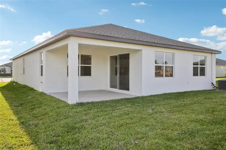 Exterior details and patio area of a home in Coasterra - Reserve Series, Palmetto (Image 3). Exterior details and patio area of a home in Coasterra - Reserve Series, Palmetto (Image 3).