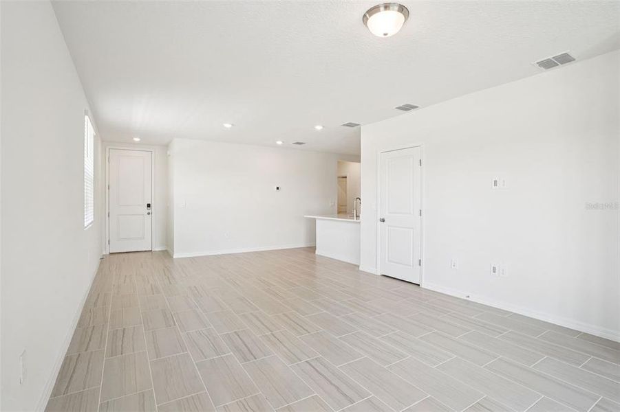 Spacious, unfurnished interior of a new home in Ridgehaven - Villas, Ormond Beach (Image 28).