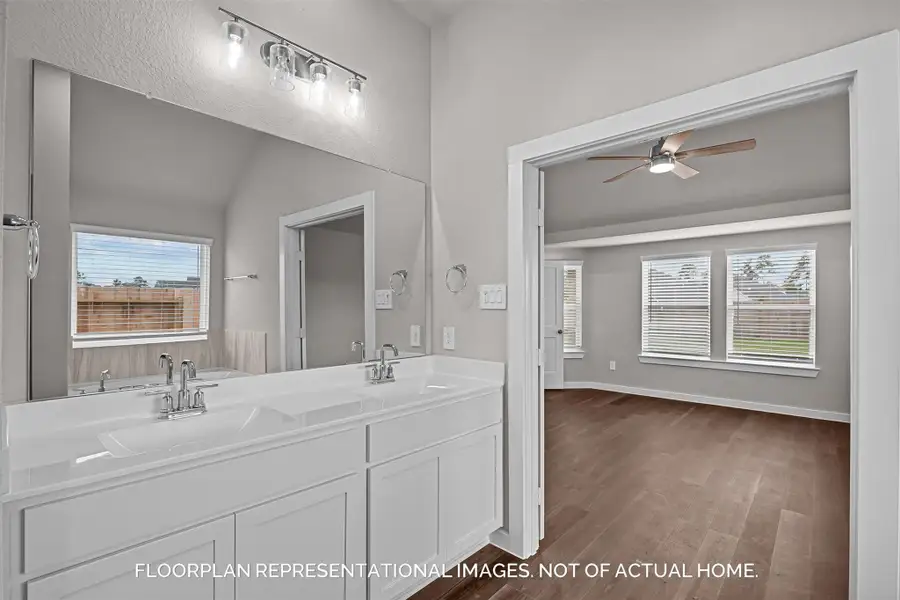 Furnished interior view inside a new home in Lone Star Landing, Montgomery (Image 6).