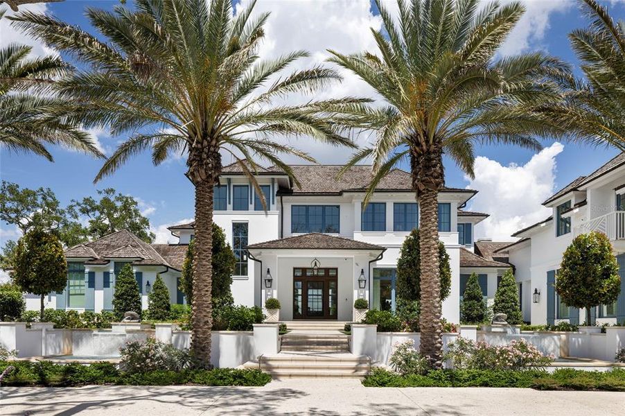 Front exterior of a new home in , Sarasota, FL, highlighting curb appeal (Image 1). Front exterior of a new home in , Sarasota, FL, highlighting curb appeal (Image 1).
