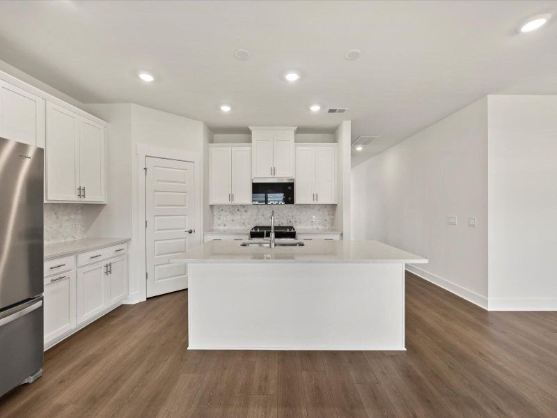 Furnished interior view inside a new home in The Coves at Lakes of Cane Bay, Summerville (Image 3). Furnished interior view inside a new home in The Coves at Lakes of Cane Bay, Summerville (Image 3).