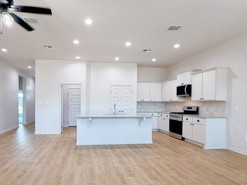 Furnished interior view inside a new home in TerraVista, Victoria (Image 6).