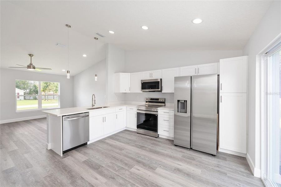 Furnished interior view inside a new home in , Dunnellon (Image 9).