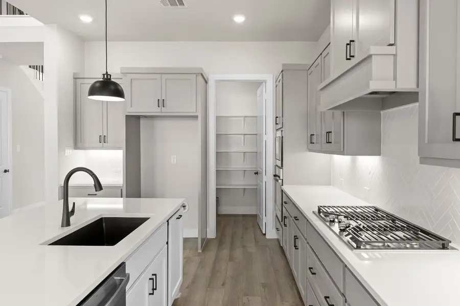 Furnished interior view inside a new home in Wildflower Ranch, Justin (Image 7).
