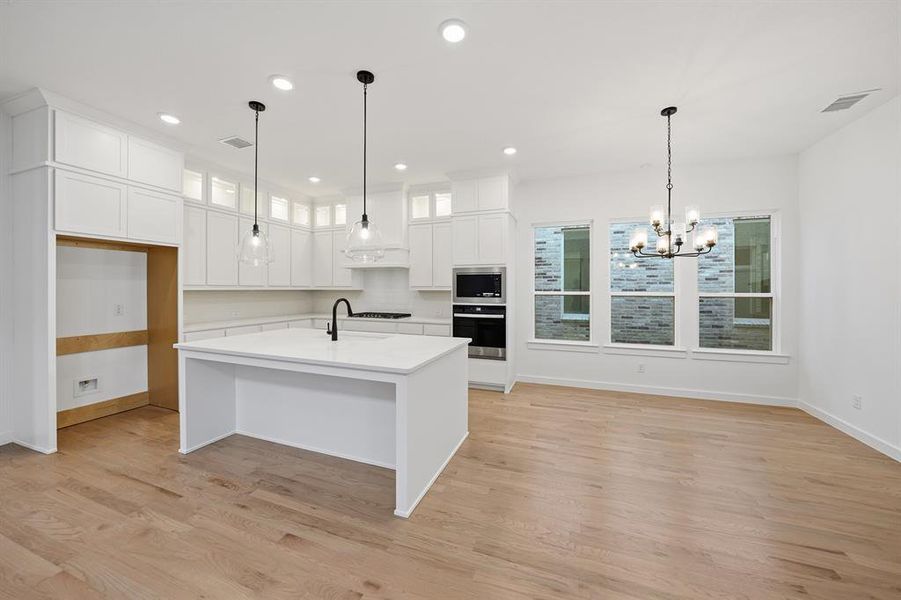 Furnished interior view inside a new home in Light Farms Brenham - 40' Lots, Celina (Image 7). Furnished interior view inside a new home in Light Farms Brenham - 40' Lots, Celina (Image 7).