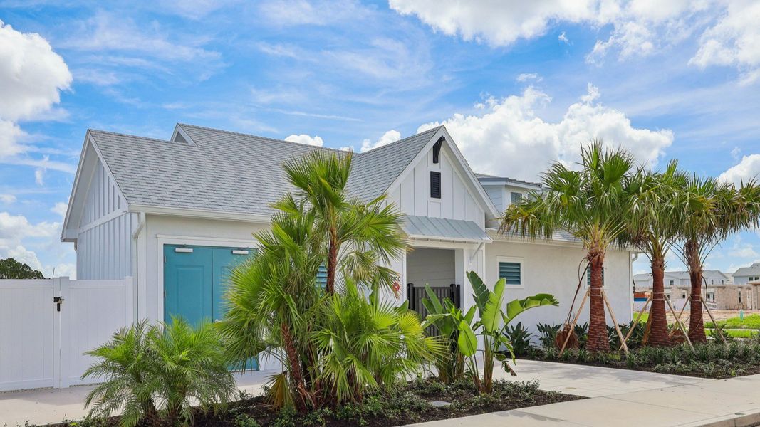 Front exterior of a new home in Cyrene at Harmony, St. Cloud, FL, highlighting curb appeal (Image 22).