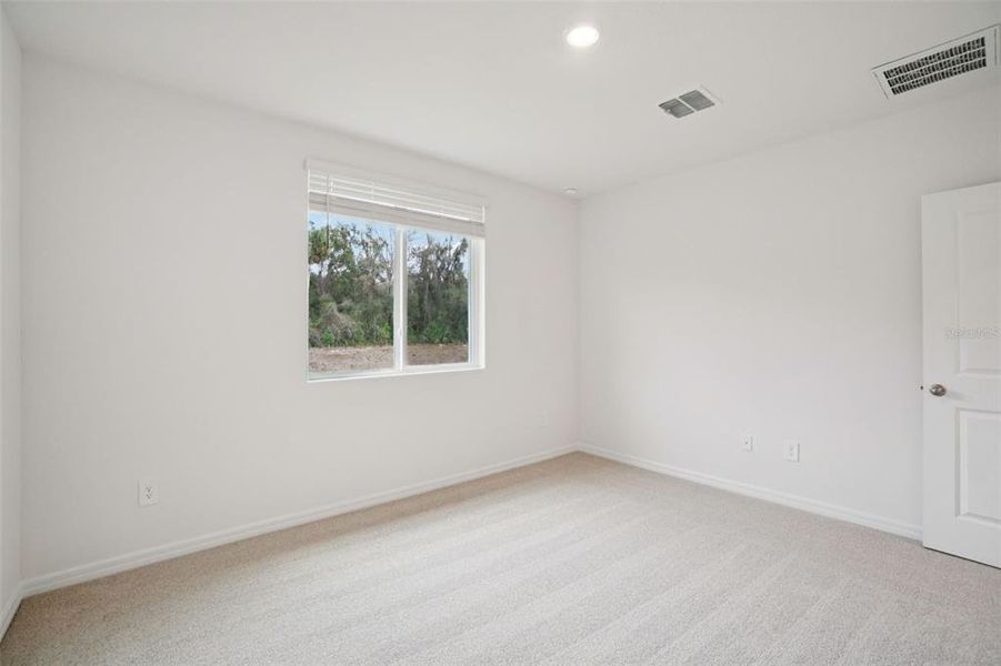 Spacious, unfurnished interior of a new home in Leyland Preserve - Classic Series, Brooksville (Image 39).