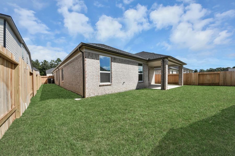 Backyard retreat, offering an abundance of space for kids to play and explore. The possibilities are endless in this outdoor haven, where the joy of open-air activities and family gatherings awaits.