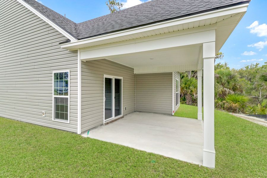 Harbor – Angled View of Exterior with Outdoor Living Space | Ernest Homes