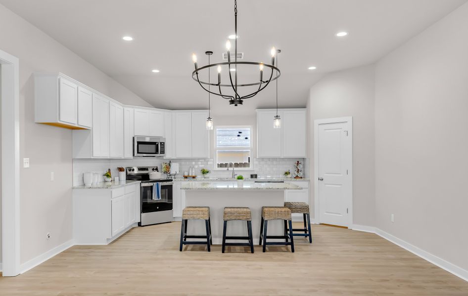 Representative furnished interior of a home built from the The Poppy by Avonley Homes in Rudder Pointe, Bryan (Image 19).