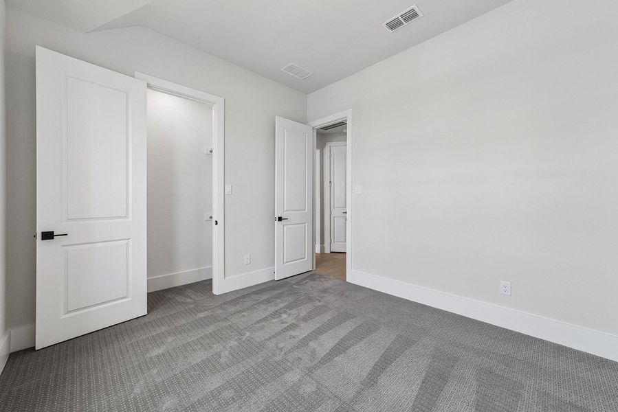 Representative unfurnished interior of a home built from the Kindrick by Landon Homes in Fields - East Village, Frisco (Image 32). Representative unfurnished interior of a home built from the Kindrick by Landon Homes in Fields - East Village, Frisco (Image 32).