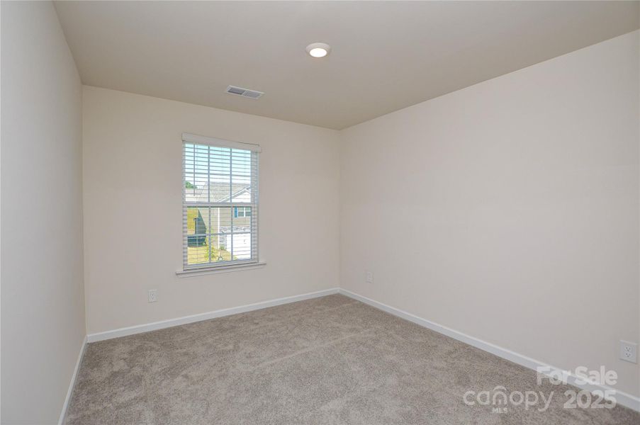 Spacious, unfurnished interior of a new home in Fergus Crossing, York (Image 28).