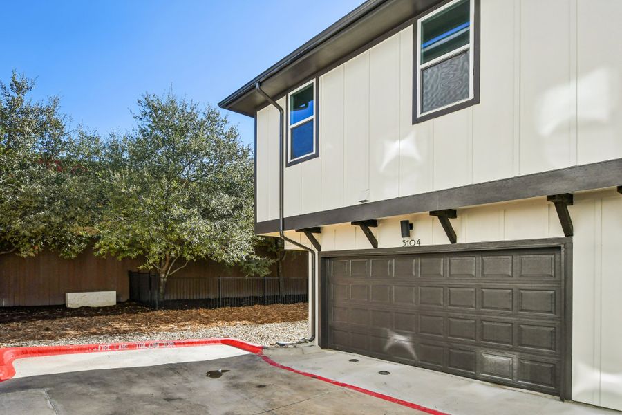 Exterior details and patio area of a home in Koenig Townhomes, Austin (Image 4).
