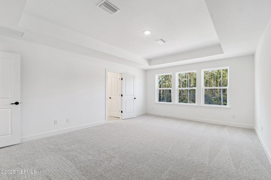 Spacious, unfurnished interior of a new home in Evergreen Island at Silverleaf - Classic, St. Augustine (Image 27).